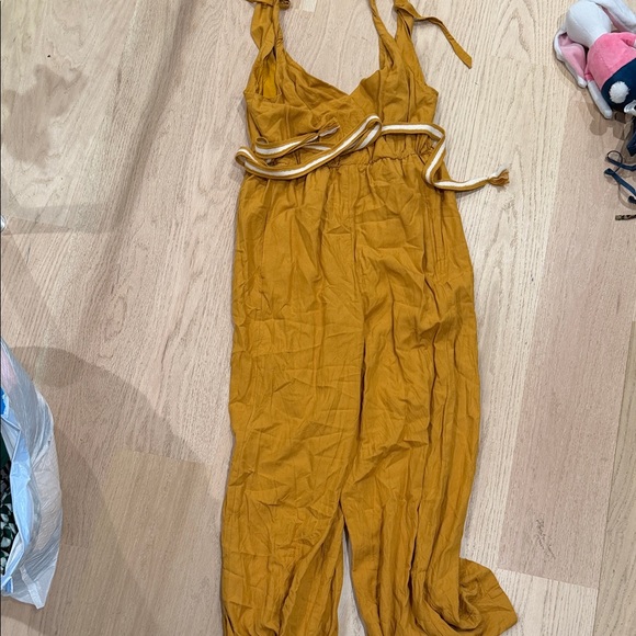 Anthropologie Pants - Anthropologie Mustard Jumpsuit with Tie Straps